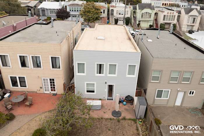 Light Mist HardiePlank siding replacement on a San Francisco home, showcasing updated exterior and Arctic White trim