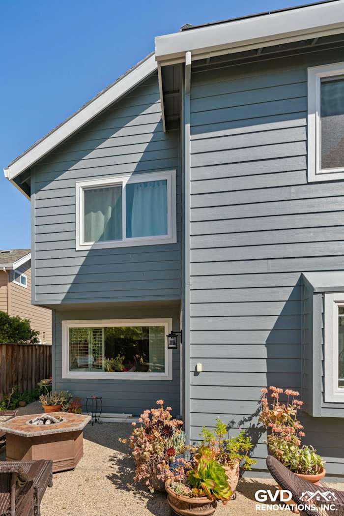 Boothbay Blue HardiePlank siding and Milgard windows on a Foster City home exterior