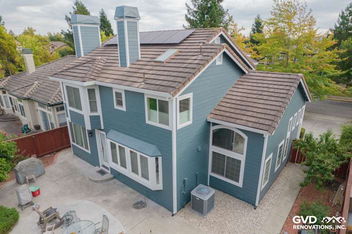 Home exterior featuring James Hardie Evening Blue lap siding and new roofing in Petaluma, CA