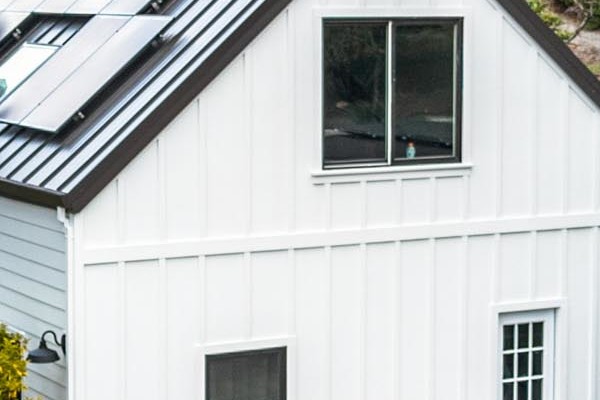 New Arctic White James Hardie siding and Marvin windows on a transformed home exterior in Sonoma, CA