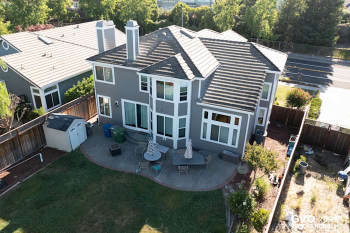 Two-story home in Petaluma with Aged Pewter James Hardie siding and Alside Mezzo windows, showcasing a modern exterior