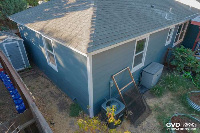 Evening Blue James Hardie siding with Arctic White trim on a remodeled home exterior in Concord, CA