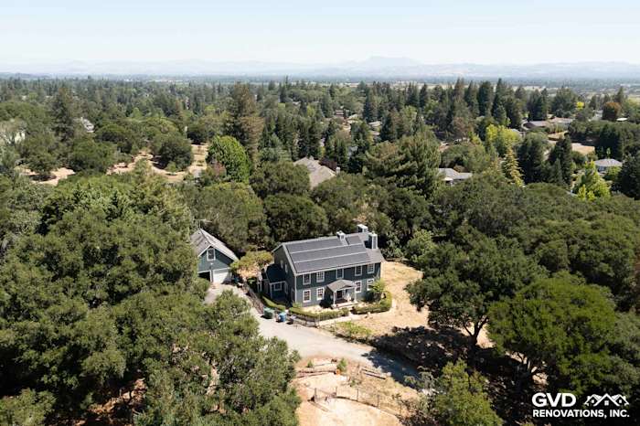 Aerial view of a home featuring Evening Blue James Hardie lap siding and Arctic White trim in Sebastopol, CA
