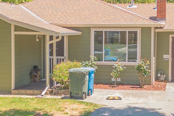 Home exterior featuring James Hardie Lap Siding in Mountain Sage with Anlin Catalina Windows in Redwood City, CA