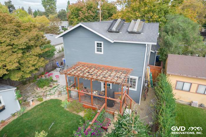 Napa home featuring fresh James Hardie Lap siding, landscaped yard, and newly installed patio structure