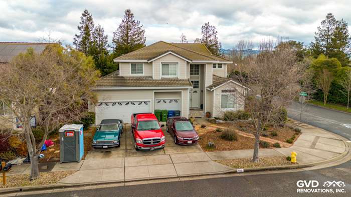 Updated home exterior in Petaluma featuring James Hardie Cobble Stone siding and Arctic White trim