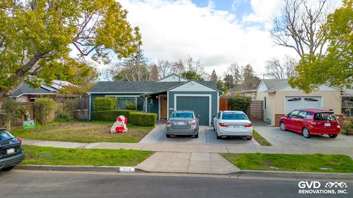 Modern home exterior showcasing James Hardie Evening Blue siding with Arctic White trim in Redwood City