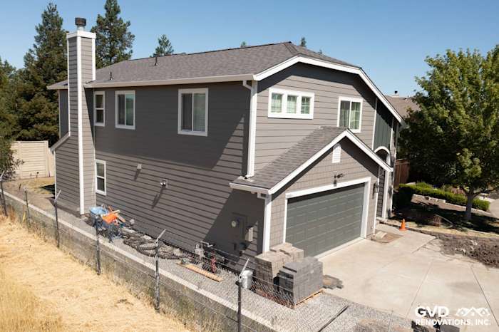 Exterior of a home in Rohnert Park, showcasing Aged Pewter James Hardie siding and Arctic White trim