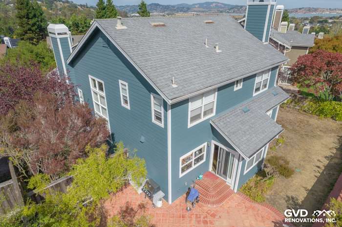 Home exterior featuring James Hardie Evening Blue siding and Arctic White trim in Corte Madera, CA