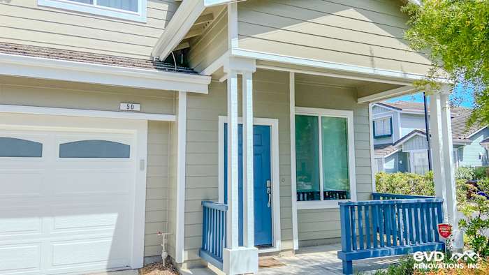 Richmond home exterior featuring James Hardie siding in Monterey Taupe, Arctic White trim, and new Anlin windows