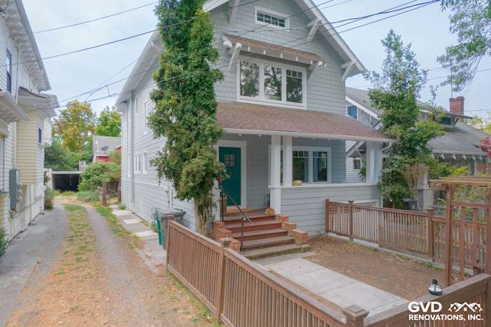 Light Mist Hardie Shingle Siding with Arctic White trim on a remodeled Oakland home, showcasing enhanced curb appeal