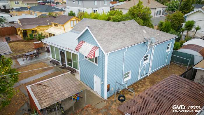 Home exterior featuring freshly installed Alside Prodigy Vinyl Siding in light blue with a gray roof in Oakland