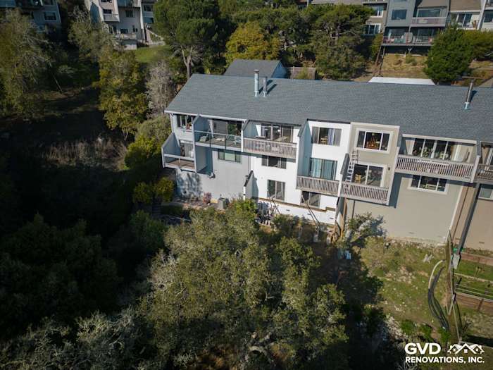 Exterior view of a modern home in Mill Valley, showcasing James Hardie Monterey Taupe siding and balconies