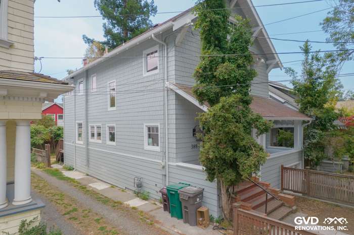 Light Mist James Hardie Shingle Siding with Arctic White trim on a remodeled home in Oakland, CA