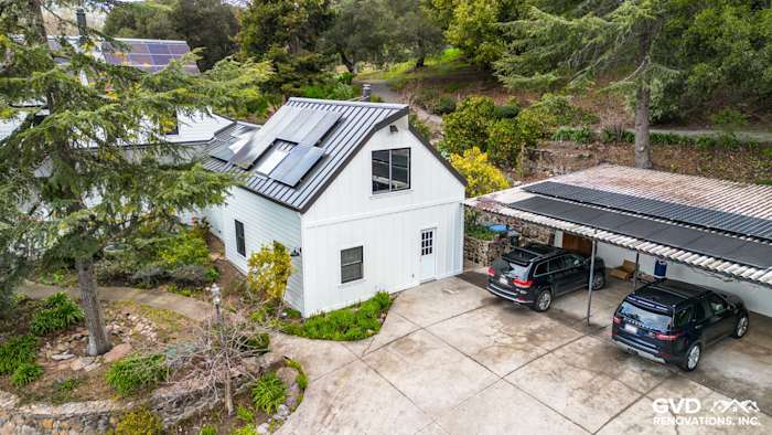 Transformative home exterior featuring James Hardie Arctic White siding and new Marvin windows in Sonoma, CA