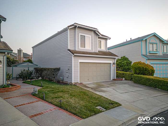 Modern Fremont home exterior featuring James Hardie Pearl Gray siding and Anlin windows. Clean lines and updated curb appeal
