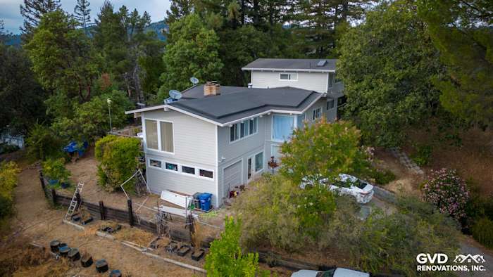 Home exterior featuring new Cobble Stone James Hardie siding and Arctic White trim in Los Gatos, CA