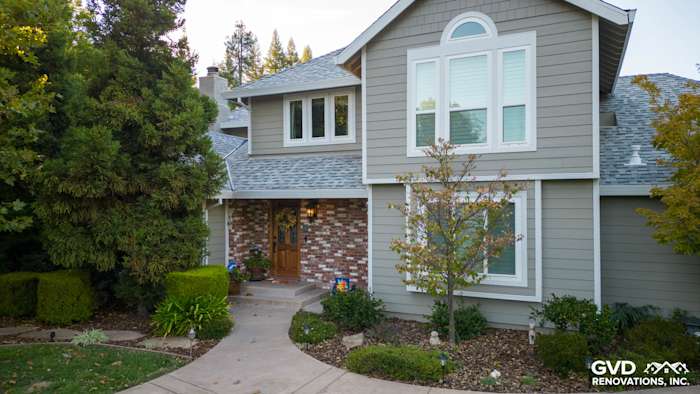 Home exterior featuring James Hardie Cedarmill siding in Monterey Taupe with Arctic White trim in Fair Oaks