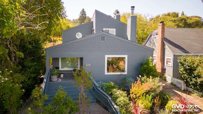 Modern home exterior featuring James Hardie Cedarmill Siding in Evening Blue with Arctic White trim in Corte Madera