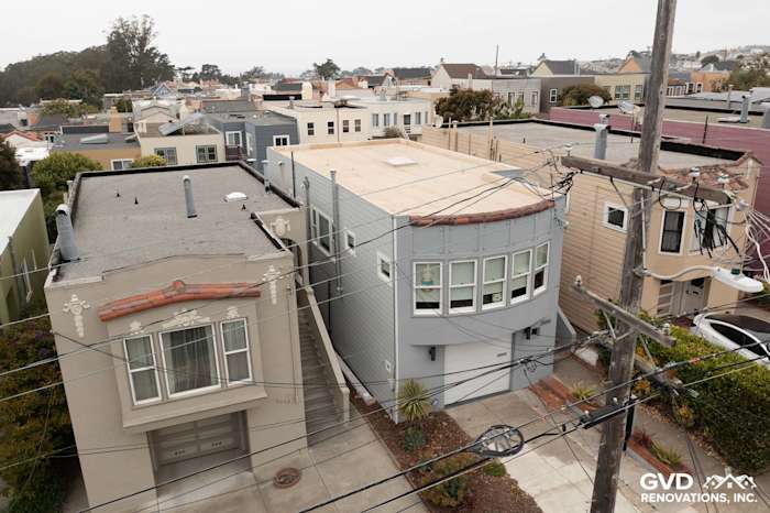Light Mist James Hardie Lap Siding with Arctic White Trim on San Francisco home exterior, showcasing modern updates