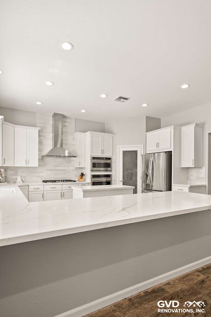 Bright, modern kitchen featuring Diamond cabinets, MSI countertops, and sleek stainless steel appliances in Roseville, CA