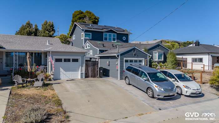 Home exterior featuring James Hardie plank lap siding in Night Gray with Arctic White trim and Anlin windows in Castro Valley