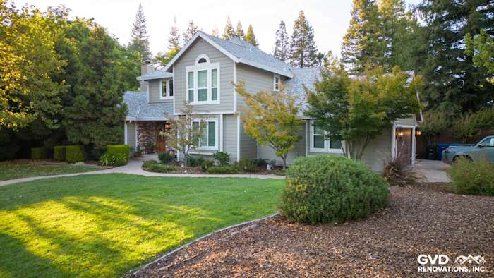 Fair Oaks home featuring James Hardie Monterey Taupe siding with Arctic White trim and landscaped yard