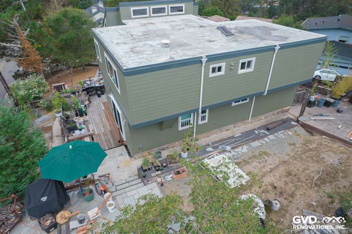 New Mountain Sage vertical siding and Anlin Catalina windows enhance this Oakland home's exterior makeover