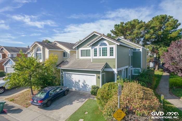 Home exterior showcasing Mountain Sage James Hardie siding and Arctic White trim in Pinole, CA