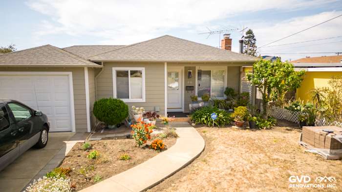 El Cerrito home featuring James Hardie Lap Siding in Monterey Taupe and Arctic White trim, landscaped front yard