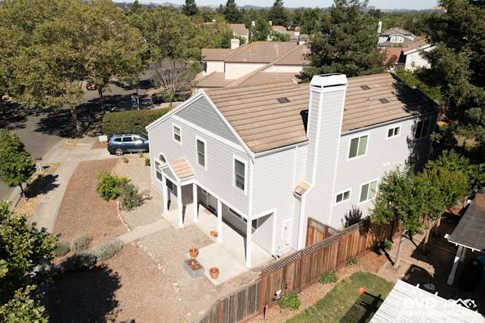 Two-story home exterior featuring Pearl Gray James Hardie siding and Arctic White trim in Petaluma, CA