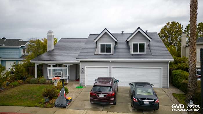 Home exterior showcasing Pearl Gray James Hardie siding and Arctic White trim in Foster City, CA