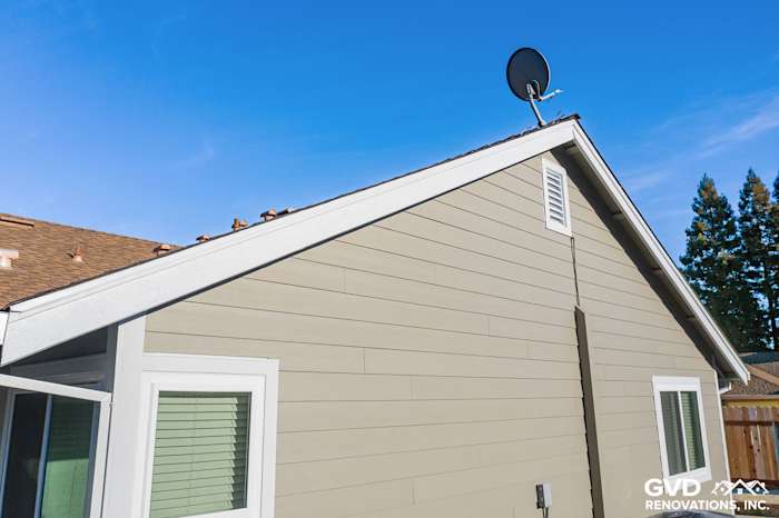 Monterey Taupe HardiePlank siding with Arctic White trim on a Folsom home exterior renovation