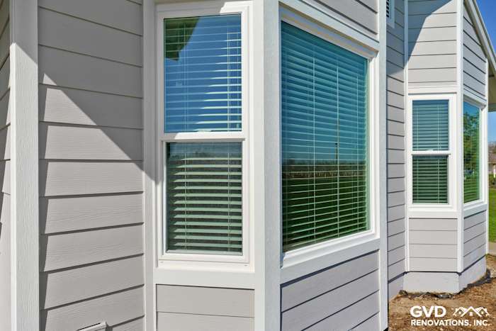 Pearl Gray James Hardie siding and Anlin windows showcasing modern design and fresh trim details in Galt, CA