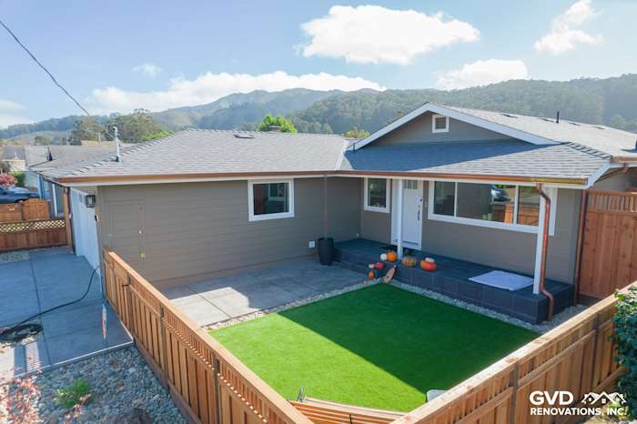 Modern home exterior featuring Timber Bark siding, Arctic White trim, and new landscaping in Pacifica, CA