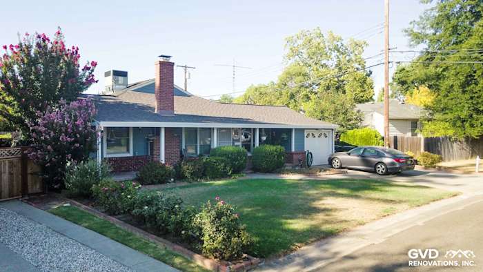 Coastal-style home exterior featuring Boothbay Blue James Hardie siding and Arctic White accents in Sacramento