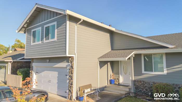Home exterior showcasing James Hardie Lap Plank Siding in Gray Slate with Arctic White trim in Petaluma, CA