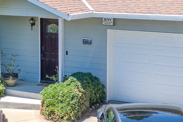 Home exterior with Cape Cod Gray Ascend Composite Cladding Siding and solar panels in Concord, CA
