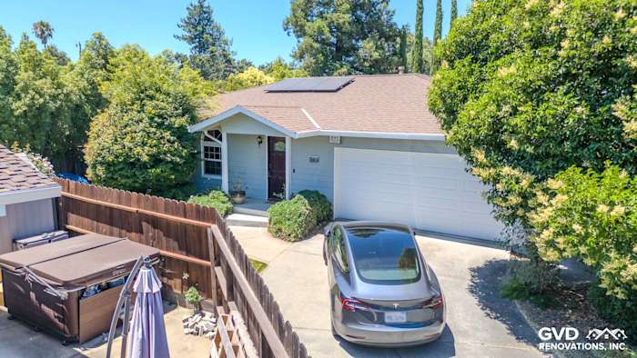 Home exterior with Cape Cod Gray Ascend Composite Cladding Siding and solar panels in Concord, CA