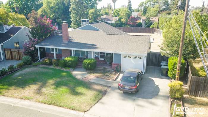 Home exterior featuring Boothbay Blue James Hardie siding and Arctic White trim in Sacramento, CA