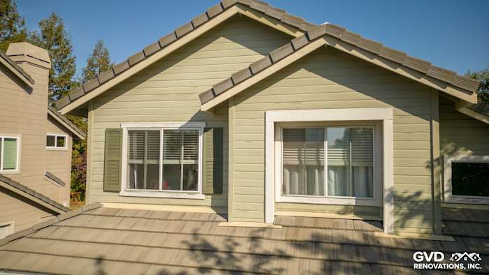 Evening Blue James Hardie siding and Milgard Tuscany windows on a Petaluma home exterior