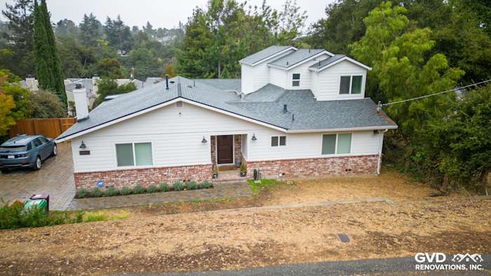 Oakland home exterior with James Hardie Cedarmill siding, HardieTrim, Alside windows, and updated landscaping