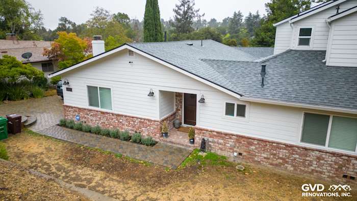 Freshly remodeled home exterior featuring James Hardie Cedarmill siding and Alside windows in Oakland, CA