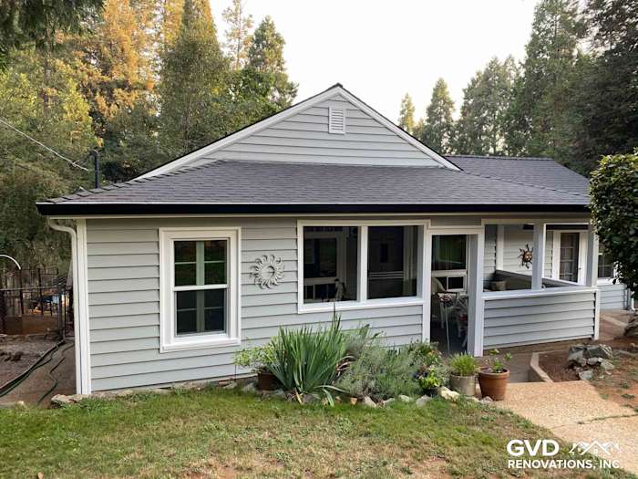 Freshly installed Prodigy Vinyl Siding in light gray on a home exterior in Grass Valley