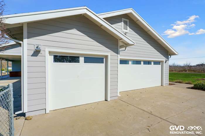Pearl Gray James Hardie siding with Arctic White trim on a home exterior in Galt, CA