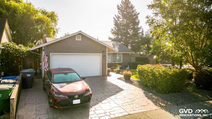 Home exterior in Rohnert Park featuring Timber Bark HardiePlank siding and Cobble Stone trim, with landscaped yard