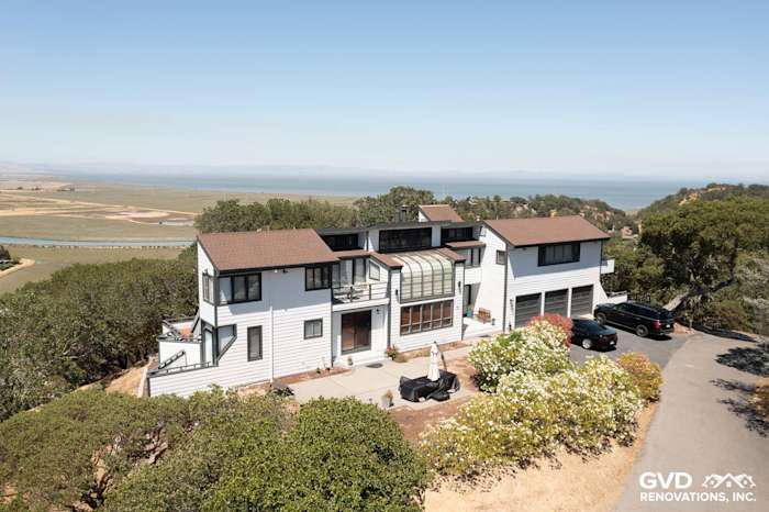 Modern home exterior in San Rafael, featuring Arctic White James Hardie Lap Siding and brown roof accents