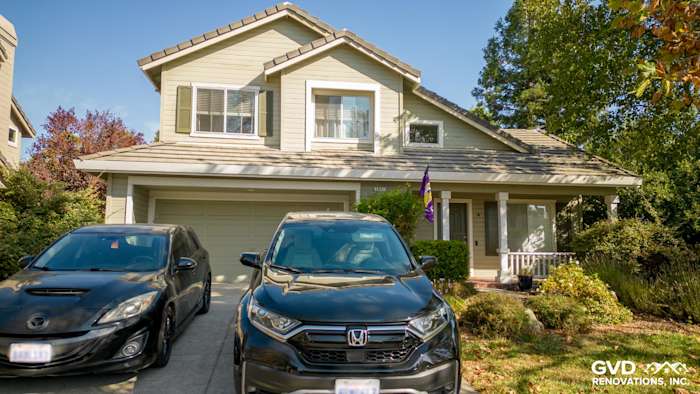 Elegant home exterior featuring James Hardie Evening Blue siding and Arctic White trim, with Milgard windows in Petaluma