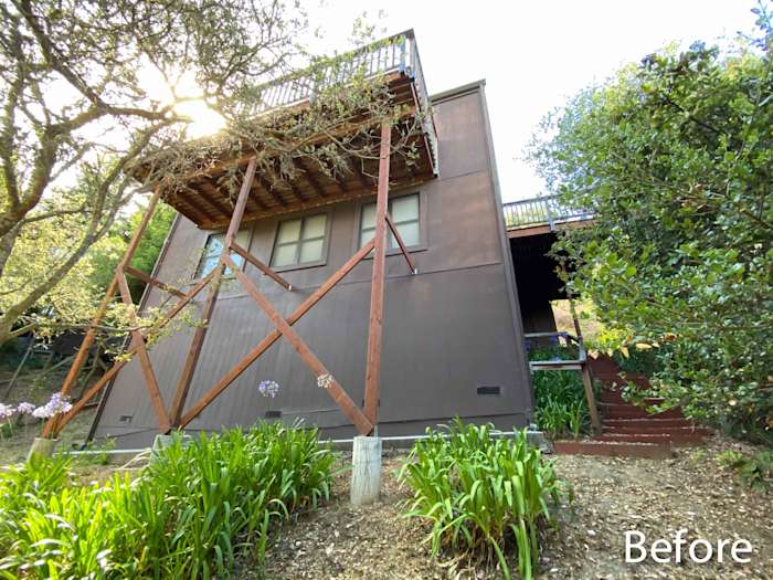 Before shot of a home exterior in Mill Valley with dark brown wood siding and wooden balcony