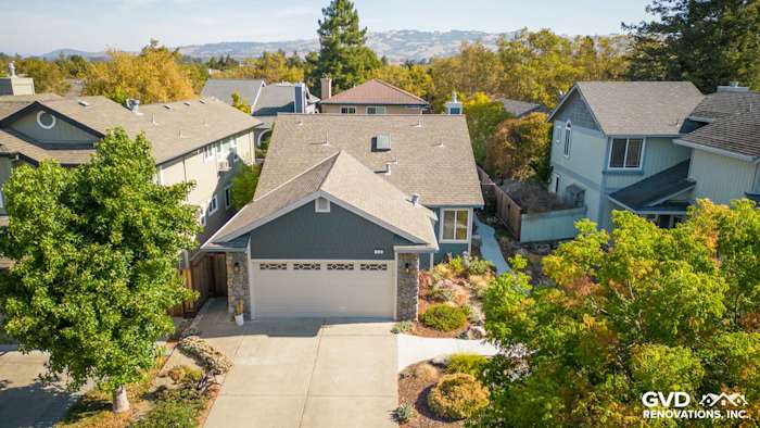 Home exterior in Petaluma featuring Evening Blue James Hardie Lap Siding and Cobble Stone Trim with landscaping